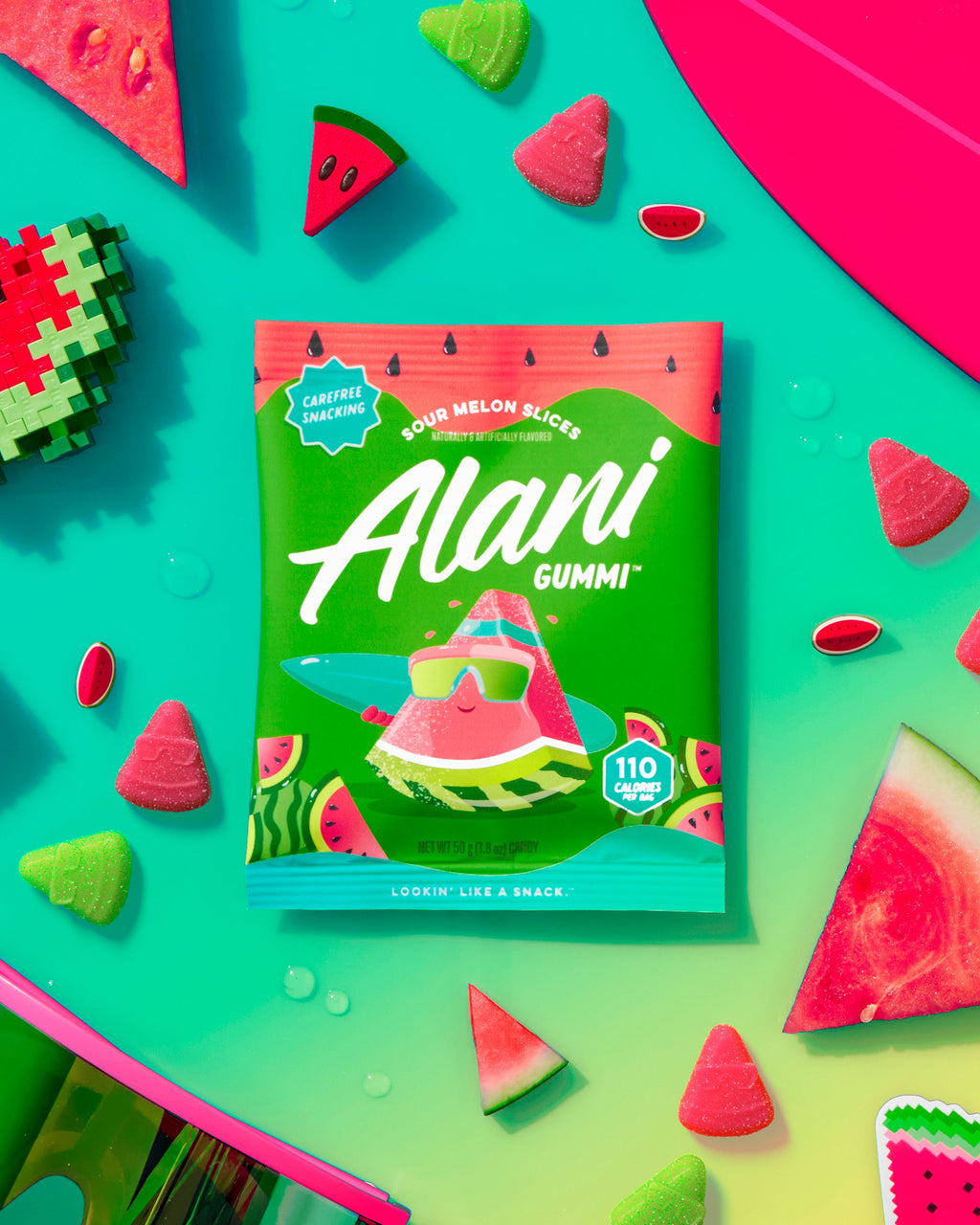 A pouch of low-calorie Sour Melon Slices surrounded by gummies and watermelon slices.